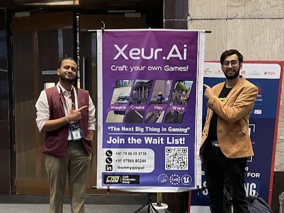 Bunny Goyal beside the Xeur AI stand at a games conference